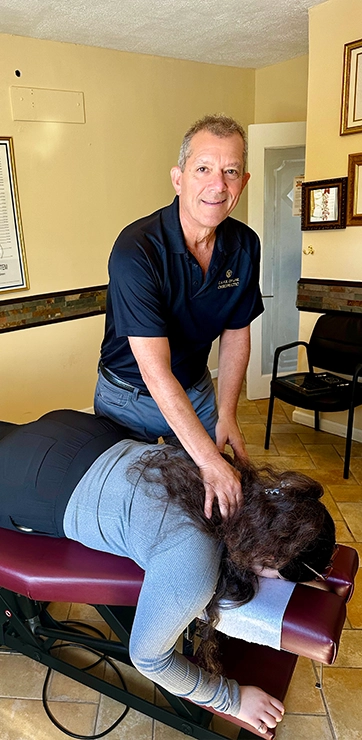 Chiropractor Allentown PA Steve Fleisher Adjusting Patient